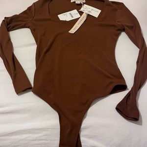 Chocolate brown longsleeved bodysuit.  boat neck, brand new never worn,  small.